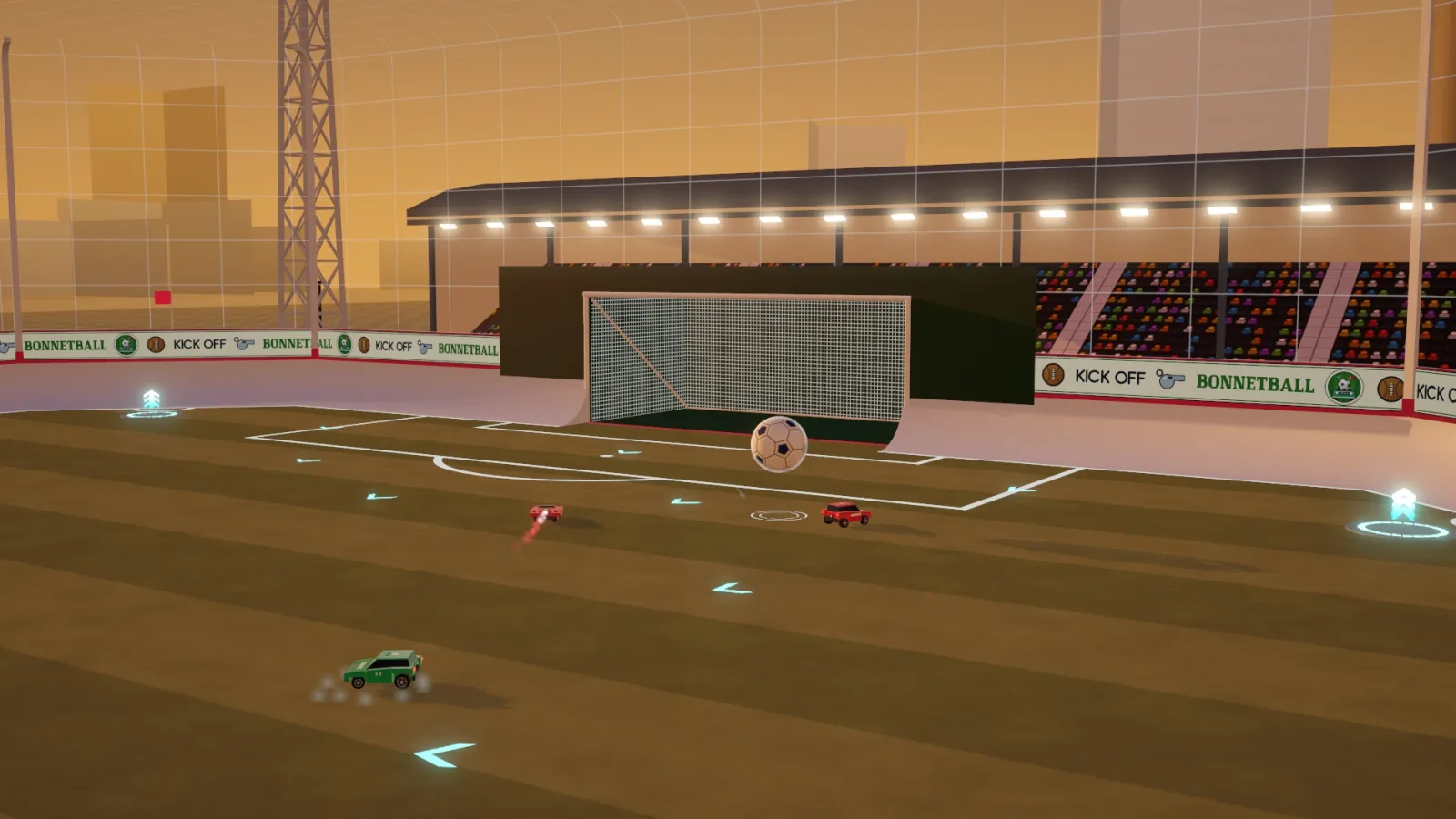 TYRESOME PARK at sunset: the cantilever stand behind the goal, with the ball and cars in play